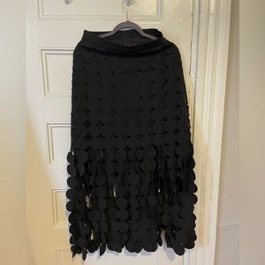 Black maxi skirt with circle pattern overlay and fringe